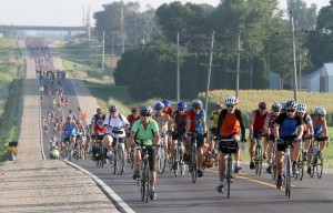 m0730ragbrai - shot 07/29/10 along RAGBRAI, IA.  Christopher Gannon/The Register -- RAGBRAI Thursday  -- Riders make their way out of Charles City Thursday morning on RAGBRAI. (Christopher Gannon/The Des Moines Register)